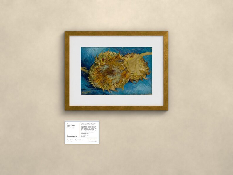 May include: A framed art print featuring two yellow sunflowers against a textured blue background, displayed with a white mat. Below the frame is a small white informational card with black text detailing the artwork's history and origin.