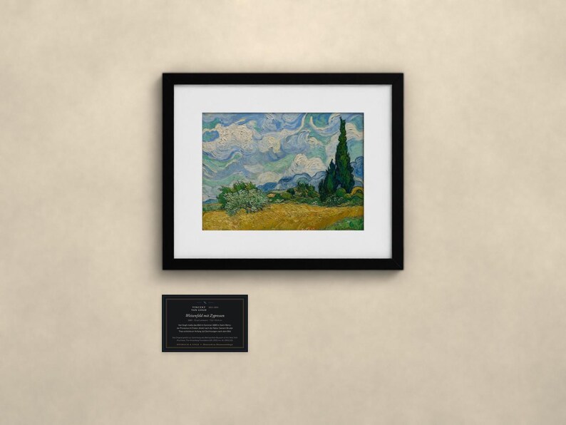 May include: A framed print of Vincent van Gogh's Wheat Field with Cypresses, featuring a golden wheat field, dark green cypress trees, and a swirling blue sky. Below the frame is a small black rectangular card with white text.