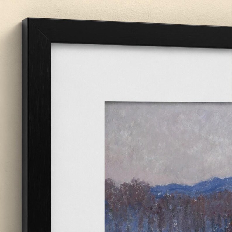 May include: A framed landscape painting featuring a muted gray sky above a line of dark blue and purple trees. The artwork is enclosed in a thin black frame with a wide white mat border, creating a clean and structured presentation.