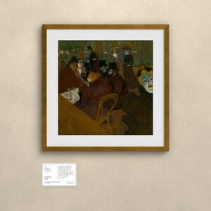May include: A framed print of the painting At the Moulin Rouge by Henri de Toulouse-Lautrec, featuring a group of people in a dimly lit interior with a prominent figure in the foreground wearing a blue-tinted mask and dark clothing.