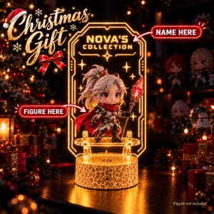 May include: An illuminated acrylic display stand featuring a central rectangular panel with the text "NOVA'S COLLECTION" and "NAME HERE" and "FIGURE HERE" arrows. The stand has a crackled texture base and a glowing golden light effect.