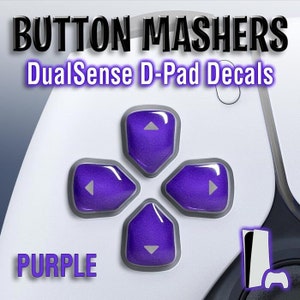 May include: Purple D-Pad Decals for the DualSense controller.  The decals are shaped like the directional buttons on the controller.  The text "BUTTON MASHERS" and "DualSense D-Pad Decals" is at the top of the image.  The word "PURPLE" is at the bottom left of the image.