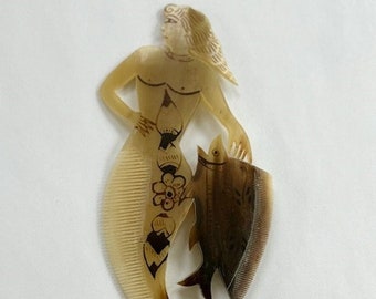 Scrimshaw mermaid and fish vintage Mexican cow horn comb