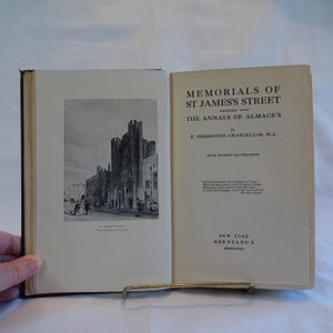 May include: A vintage book titled "Memorials of St James's Street" with the subtitle "Together with The Annals of Almack's" by E. Beresford Chancellor, M.A. The book cover features a black and white photograph of St. James's Church.