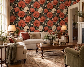 May include: A living room featuring wallpaper with a dark background and a repeating pattern of large red and white poppy flowers. The room includes a beige sofa, a beige armchair with a green throw blanket, and a wooden coffee table.