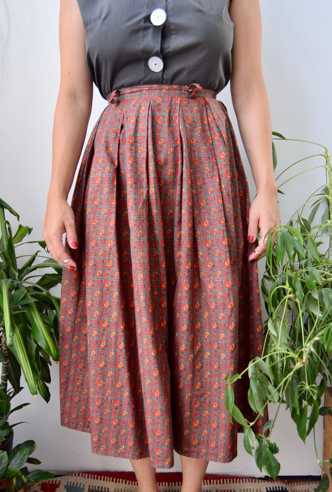 Falda midi Elif en tejido compacto con estampado de cachemira en color vino main image 0