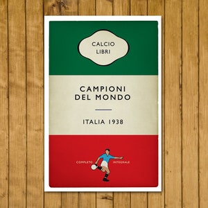 May include: A rectangular poster with a green, white, and red color scheme. The poster features the text "CALCIO LIBRI", "CAMPIONI DEL MONDO", and "ITALIA 1938". A soccer player illustration is at the bottom.