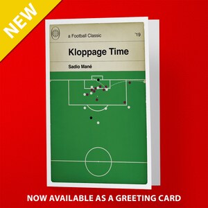 May include: A green and white football field with a soccer ball and players in a cartoon style. The text "Kloppage Time" is at the top of the image, with the text "Sadio Man&eacute;" below it. The text "a Football Classic" is at the top left of the image, and the text "'19" is at the top right of the image.