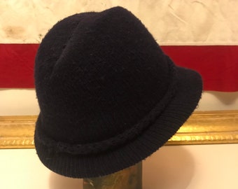 Navy blue vintage winter fedora shaped hat.