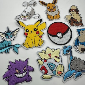 May include: A set of 10 embroidered iron-on patches featuring various Pokemon characters, including Pikachu, Eevee, Squirtle, and a Pokeball. The patches are colorful and detailed, perfect for adding a touch of fandom to clothing, bags, or other accessories.