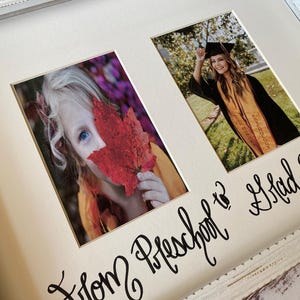 May include: A white framed photo collage with two pictures. One photo shows a child holding a red leaf, and the other shows a person in a graduation gown. The words "From Preschool to Grad" are written in cursive.