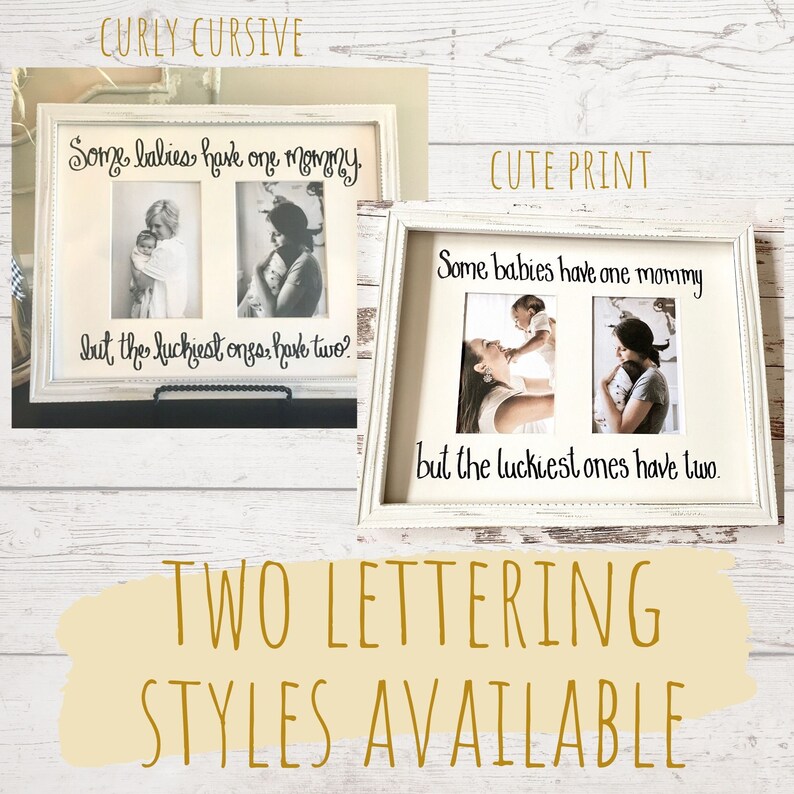 May include: Two white framed photo displays with the text "Some babies have one mommy but the luckiest ones have two." Each frame holds two photos. The top frame has curly cursive text, and the bottom frame has a cute print style. The text "TWO LETTERING STYLES AVAILABLE" is also present.