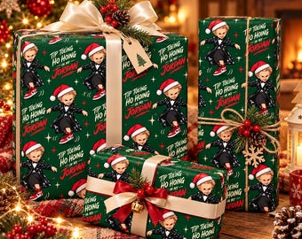 May include: Three gift boxes wrapped in dark green paper featuring a repeating pattern of a character in a tuxedo and Santa hat with the text Tip Toe-ing Ho Hoing In My Jordan. The boxes are decorated with satin ribbons, twine, and pine cones.