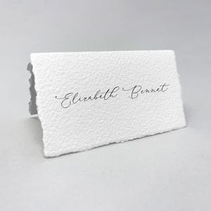 Printed cotton paper place cards with hand torn edges. 3.5x2 Tented name cards or escort cards in a luxurious thick textured cotton rag.