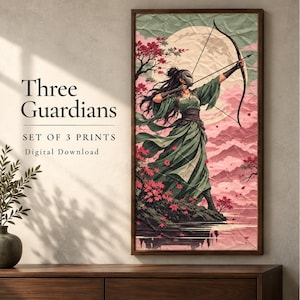 May include: A vertical wall art print titled Three Guardians Set of 3 Prints Digital Download. The artwork depicts a figure in a green robe and white mask aiming a bow and arrow against a large moon, pink mountains, and red maple leaves.