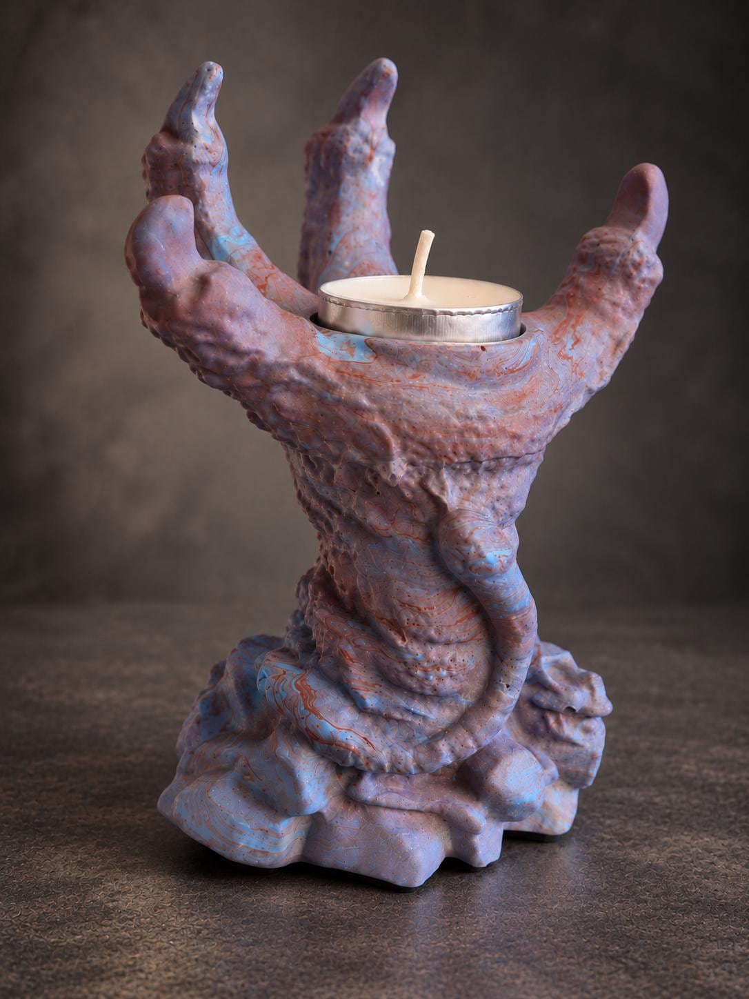 Marbled dragon claw tea light holder
