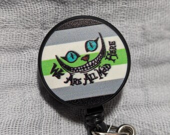 We're All Mad Here Badge Reel Belt Clip