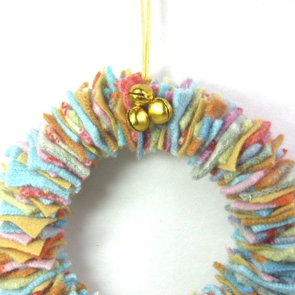 Scrap wool wreath Easter pastel colors Eco friendly home decor Upcycled sweaters Recycled materials