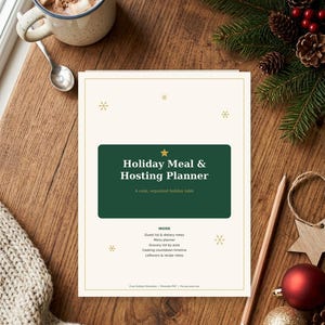 May include: A white planner page titled Holiday Meal & Hosting Planner with a dark green rectangle, gold star, and snowflake accents. The text lists sections for guest lists, menu planning, grocery lists, cooking timelines, and recipe notes.