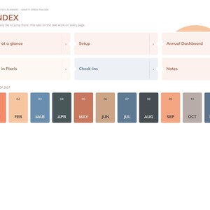 Peut inclure: Une page d'index de planificateur num&eacute;rique pour 2027 intitul&eacute;e INDEX, avec des onglets de navigation &agrave; gauche et des tuiles pour Year at a glance, Setup, Annual Dashboard, Year in Pixels, Check-ins et Notes. Douze tuiles mensuelles color&eacute;es.