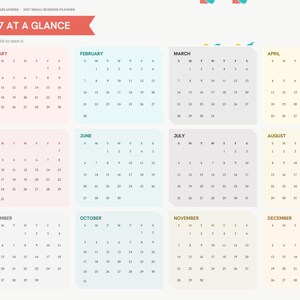 May include: A 2027 digital business planner page titled 2027 AT A GLANCE, featuring a twelve-month calendar grid. The layout includes a left-hand navigation sidebar with tabs for Index, Year, Vision, Quarterly, and monthly sections, all displayed in soft pastel colors.