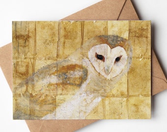 May include: A greeting card featuring a painting of a white barn owl with yellow and brown accents on a textured background.