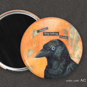 May include: A round orange and black button with a crow and the text "Please Stop talking thanks" on it. The button is a mirror on the back.