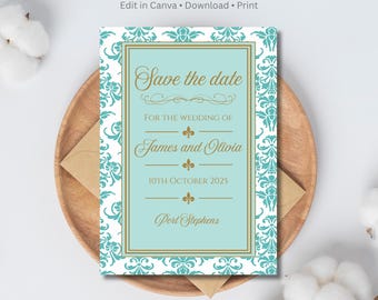May include: A rectangular save the date card featuring an aqua damask pattern border and a central light blue panel with gold text that reads: Save the date, FOR THE WEDDING OF, James and Olivia, 10TH OCTOBER 2025, Port Stephens.