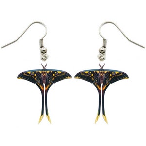 May include: A pair of dangle earrings featuring a colorful moth design with black, yellow, and purple accents. The earrings have silver hooks.