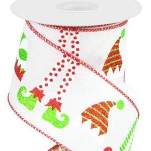 May include: White wired ribbon with a red and green elf design. The ribbon features elf legs, elf shoes, and elf hats.