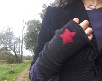 black fleece mittens and red star