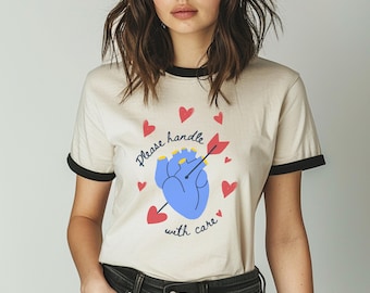Retro Heart Women's Graphic Tshirt: Handle with Care Vintage Design on Ringer Tee