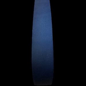 May include: A close-up of a dark blue leather strap.