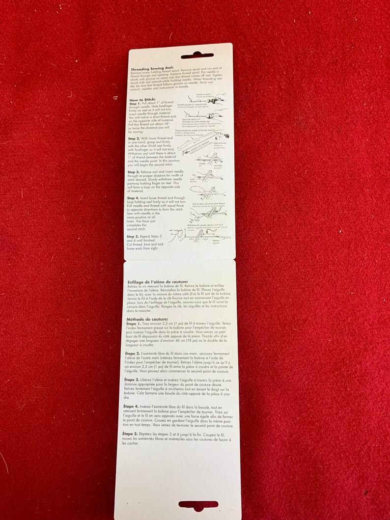 May include: Instructions for threading and using a sewing awl. The awl is a small, handheld tool with a pointed end used for making holes in fabric. The instructions include illustrations showing how to thread the awl and how to make a stitch.