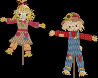 May include: Two embroidered scarecrows on a black background. One scarecrow wears a dress with a red top and straw hair. The other scarecrow wears blue overalls, a hat with a sunflower, and straw hair. Both have outstretched arms.