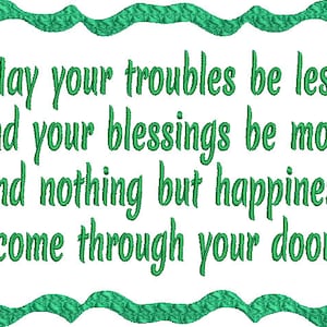May include: A white background with green text that reads "May your troubles be less and your blessings be more and nothing but happiness come through your door." The text is in a cursive font and is framed by a green, textured border.