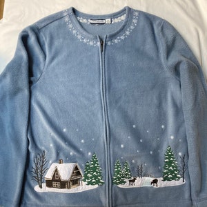 ヴィンテージブルーのスノーイングクリスマスジップアップセーター（サイズM）
