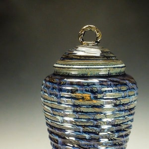Handmade pottery bowl.  Rutile blue glaze.
