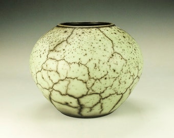 Naked Raku Pottery.  Green Terra Sigillata, hand polished.