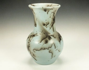 Horsehair Raku Pottery.  Light blue Terra Sigillata, hand polished.