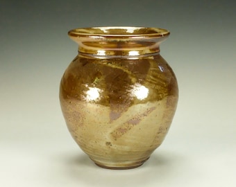 Handmade pottery flower vase.  Wood fired Shino glaze.