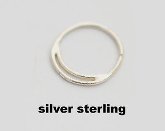 May include: A silver sterling hoop earring with a simple, curved design.
