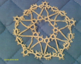 Delicate hand tatted circle snowflake, Ecru color, the circle meaures 3 1/2 inches in diameter, lovely