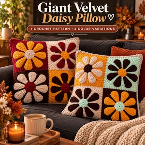 May include: Two square crochet pillows featuring a four-panel daisy design. The text reads Giant Velvet Daisy Pillow, 1 Crochet Pattern, 2 Color Variations. The pillows display various color combinations including yellow, maroon, white, brown, and light blue.