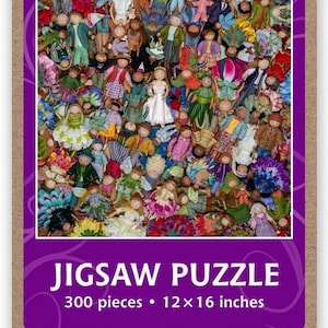 May include: A colorful 300-piece jigsaw puzzle featuring a whimsical scene of many small dolls dressed in various outfits and surrounded by flowers. The puzzle measures 12x16 inches.