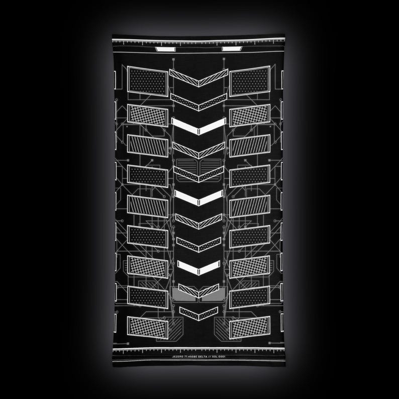 May include: A black rectangular neck gaiter featuring a white geometric pattern of chevrons and grid-filled rectangles. The design includes thin lines and the text JEZERO 77 ASGGE DELTA 17 SOL 0001 printed in small white letters at the bottom edge.