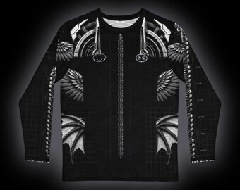 May include: A black long-sleeve shirt featuring a white graphic print of mechanical wings, architectural arches, and a central vertical spine-like design. The pattern includes grid lines and symmetrical wing motifs on the chest and sleeves.