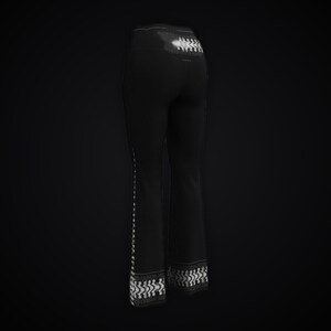 May include: Black high-waisted pants featuring a white geometric pattern along the outer side seams and the bottom hem. The design includes a repeating linear motif that extends from the waist down to the flared leg openings.