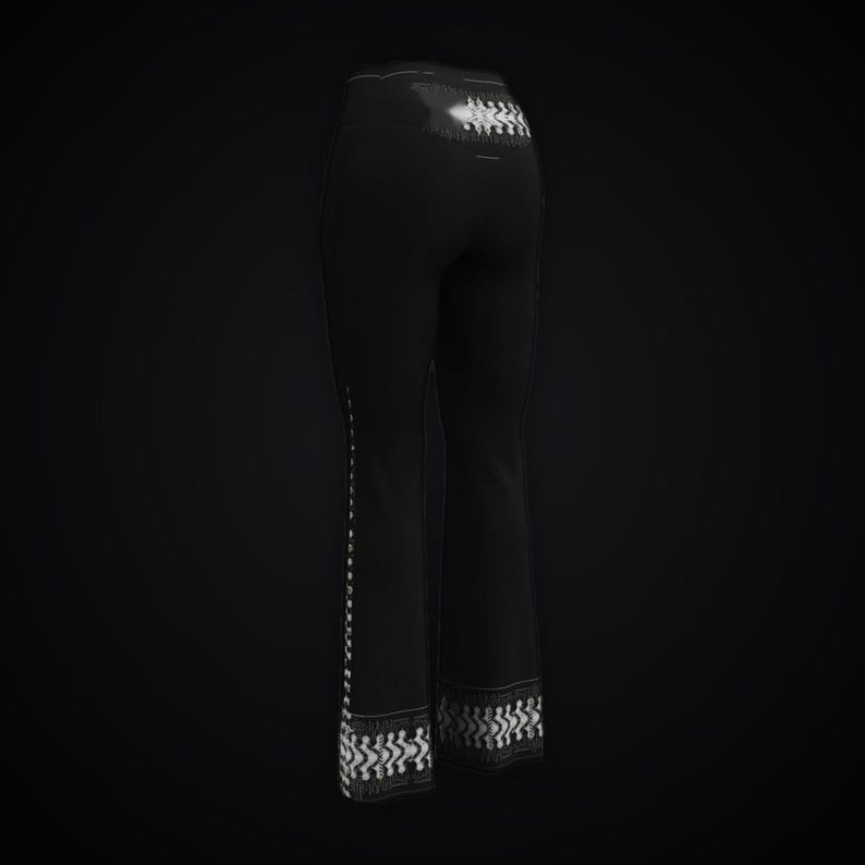 May include: Black high-waisted pants featuring a white geometric pattern along the outer side seams and the bottom hem. The design includes a repeating linear motif that extends from the waist down to the flared leg openings.