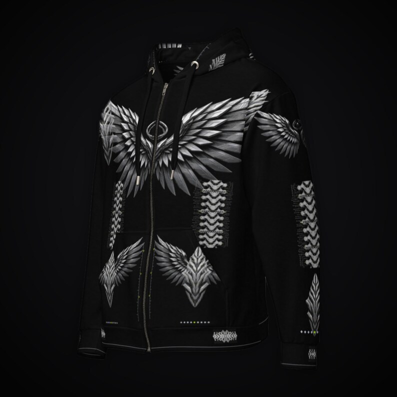 May include: A black zip-up hoodie featuring a large white and gray graphic of feathered wings across the chest and smaller wing motifs on the lower front and sleeves. The design includes vertical spinal-like patterns and a hood with drawstrings.